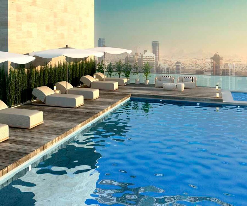 Swimming pool with sunbathing area